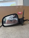 2000 Jeep Grand Cherokee Driver Side Mirror E1010581. Fixed Price $65.00.