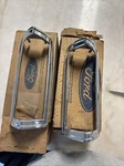 Nos 1977-1979 Thunderbird Parking Lamp Bezels Pair D7SZ-13210/12. Fixed Price $189.00.