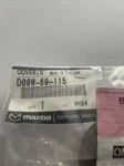 D09W-69-115 Mazda Trim For Right Mirror. Fixed Price $6.00.