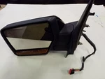 Black Left Driver Side View Mirror Heated & Lights Fits 07 08 Ford Expedition. Fixed Price $160.00.