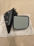 New Oem Left Door Mirror For 1994 2009 Mazda ZZP0-69-180. Fixed Price $88.00.
